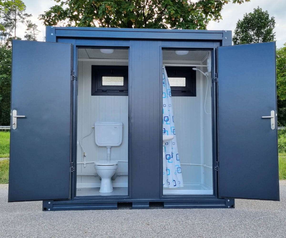 CONTENEDOR SANITARIO CON DUCHA, INODORO Y URINARIO